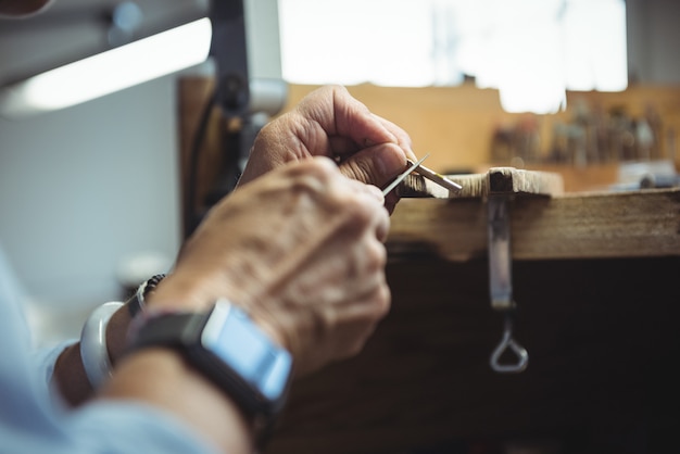 Craftswoman working in workshop