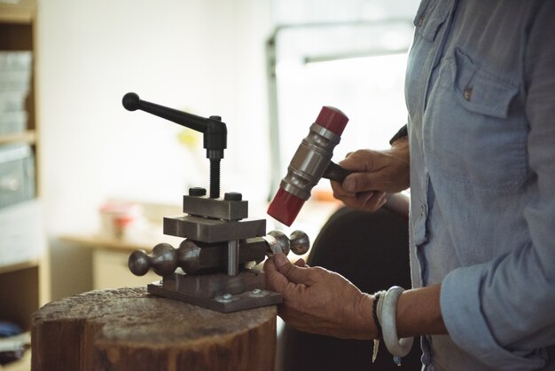 Craftswoman working in workshop