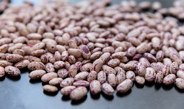 cranberry roman beans on dark table