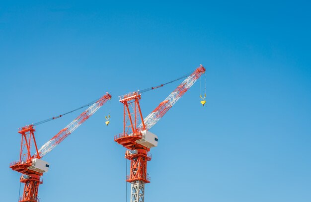 Crane and building construction site