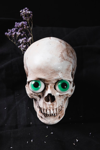 Cranium with fancy eyeballs and flowers