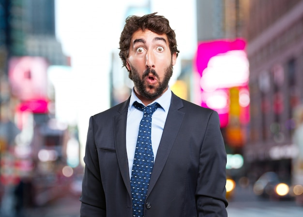 Free photo crazy businessman surprised expression