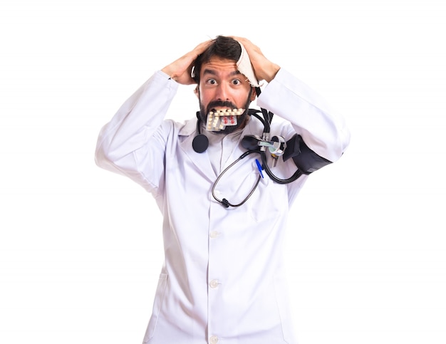 Free photo crazy doctor over white background