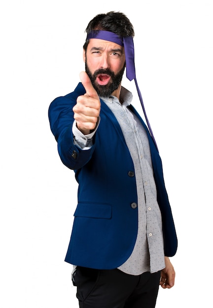 Crazy and drunk businessman with thumb up