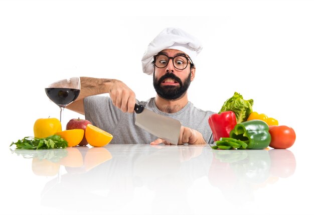 Crazy hipster chef cutting his finger