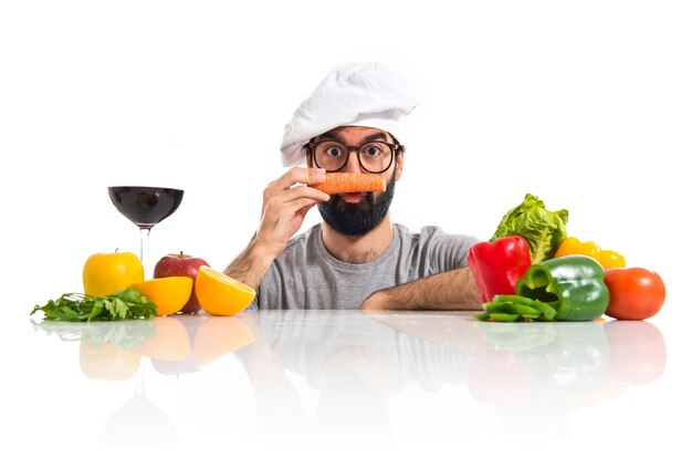 Crazy hipster chef with carrot like moustache