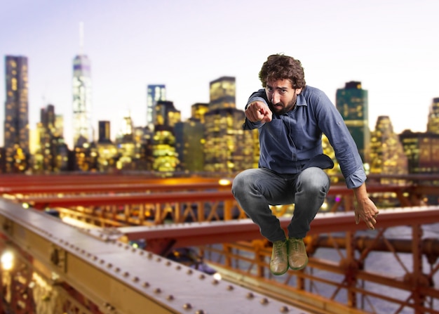 Free photo crazy man jumping. surprised expression