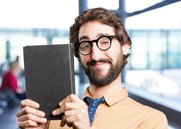 crazy man with book.funny expression