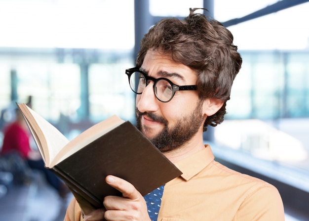 Free photo crazy man with book.funny expression