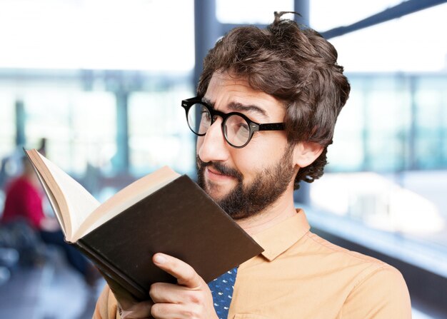 crazy man with book.funny expression