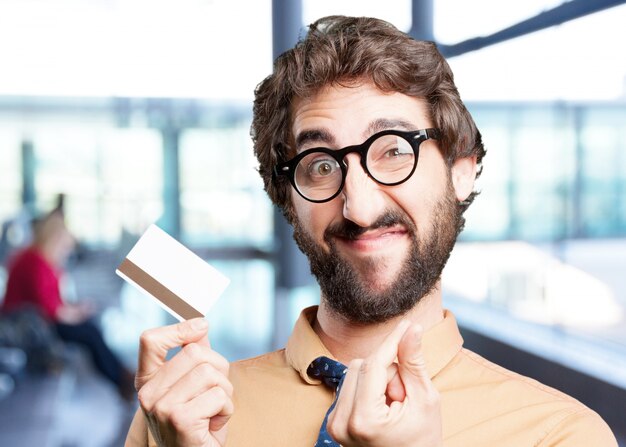 crazy man with credit card.funny expression