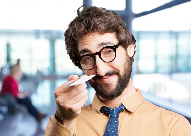 crazy man with credit card.funny expression