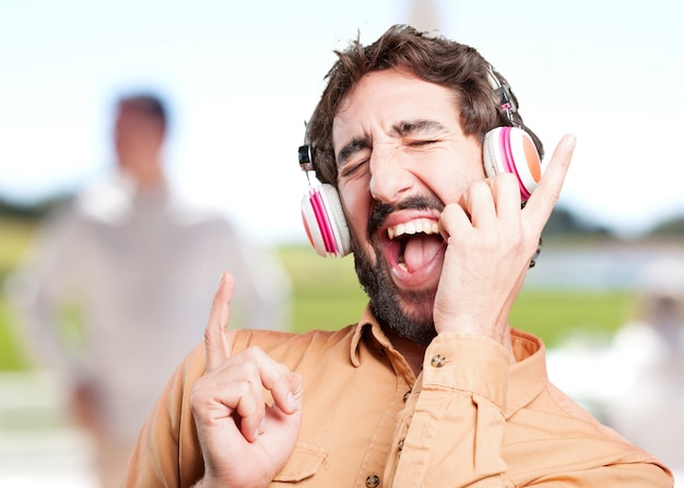 crazy man with headphones.funny expression