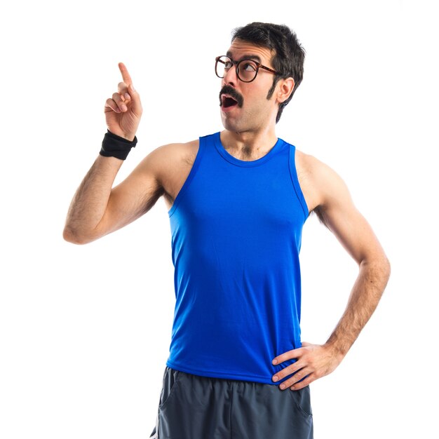 Crazy sportman thinking over white background