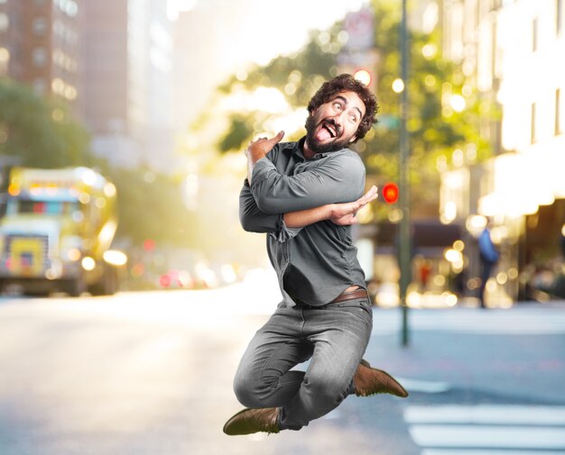 crazy young man jumping. happy expression