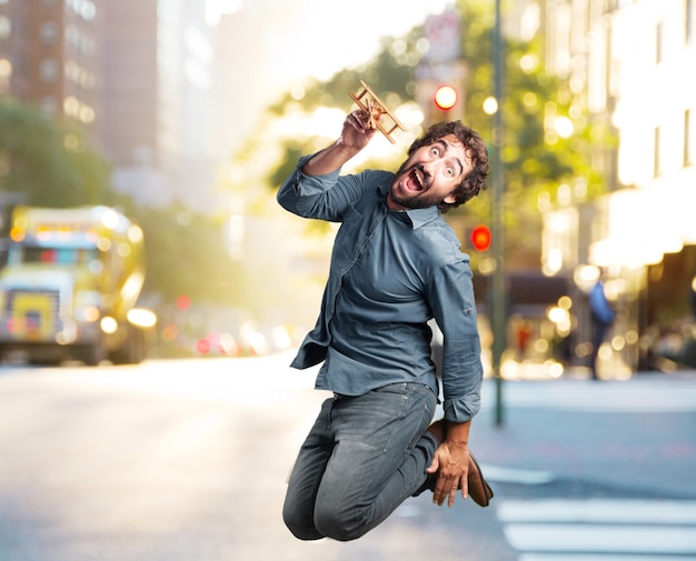 crazy young man jumping. happy expression