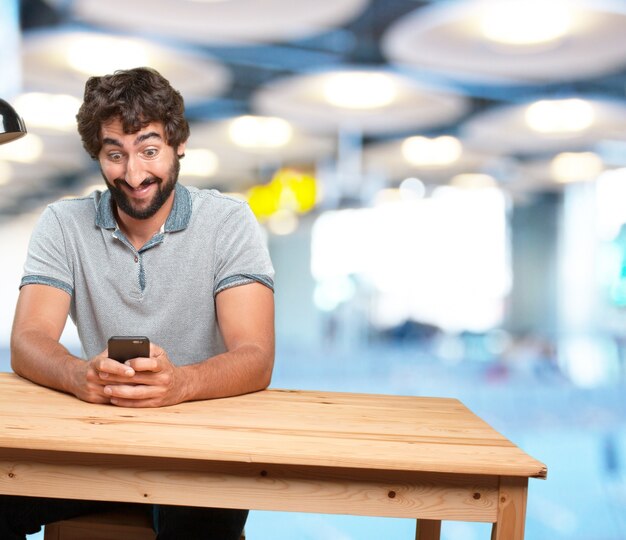 crazy young man with table .happy expression