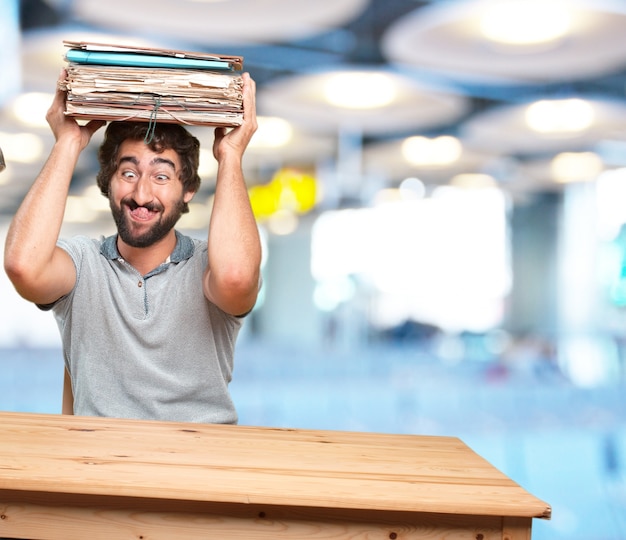 crazy young man with table .happy expression