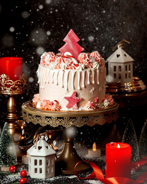 Free photo creamy dessert with pink candy tree on top