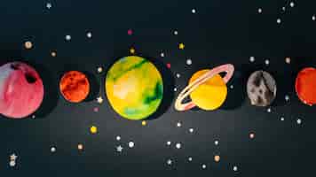 Free photo creative assortment of paper planets