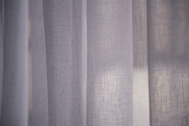 Creative background with curtain and shadow from window