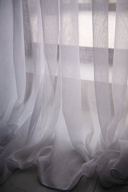 Creative background with curtain and shadow from window