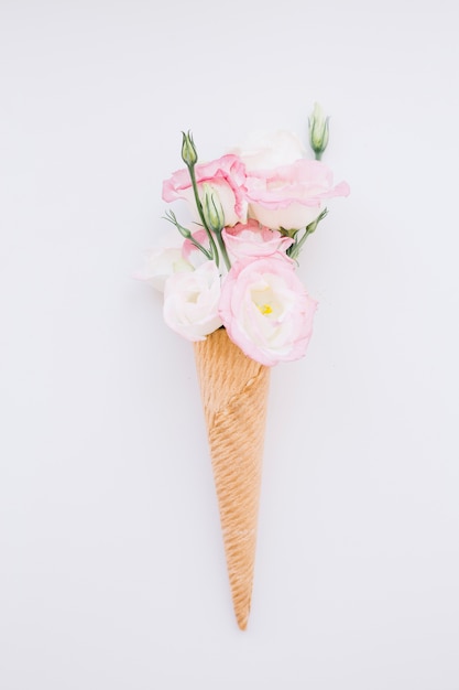 Creative composition of flowers in cone