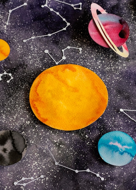 Free photo creative composition of paper planets