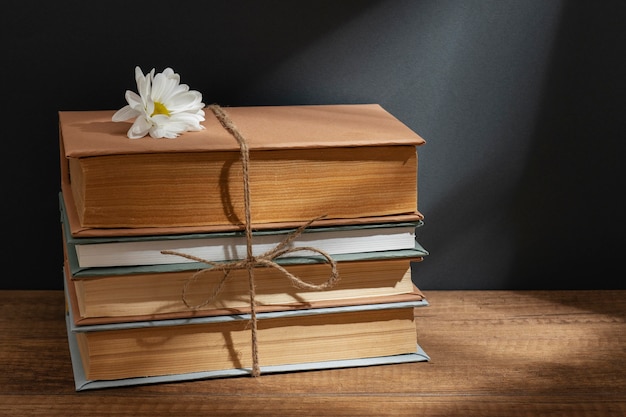 Creative composition with books and flower