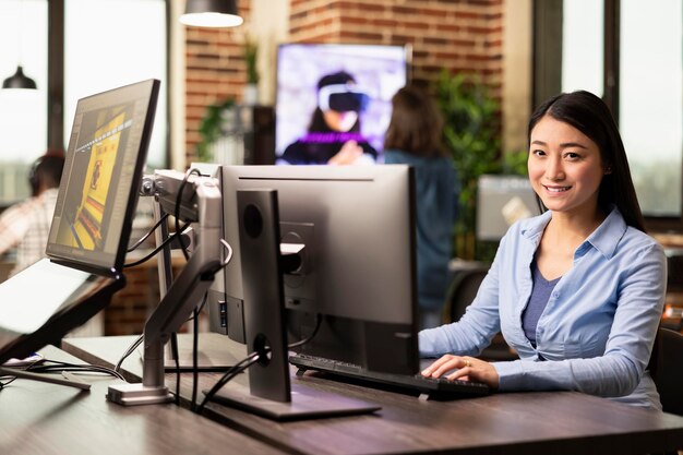 creative female professional at desk