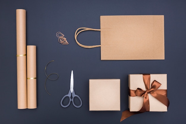 Creative gift wrapping composition on dark background