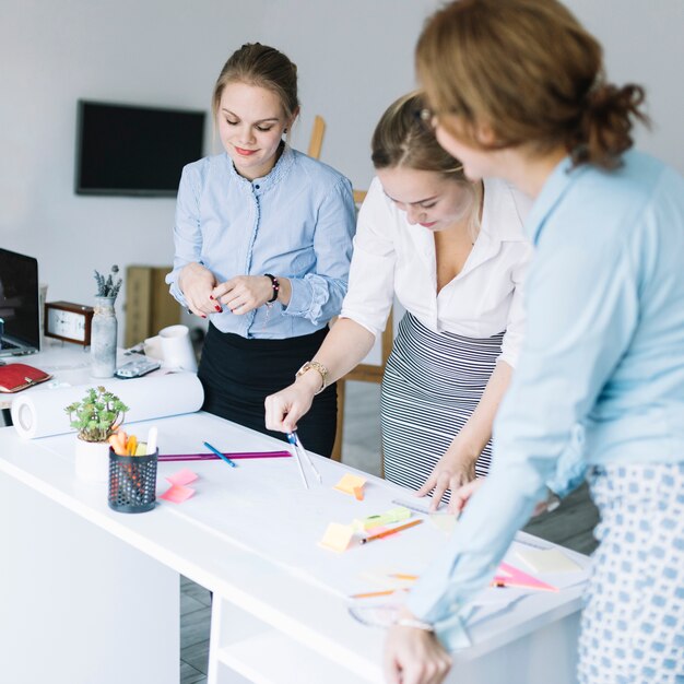 Creative group of businesswoman preparing business plan in office