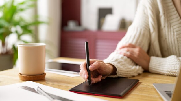 Creative illustrator working on devices