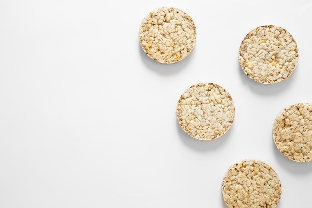 Free photo creative layout made of rice cakes on the white background