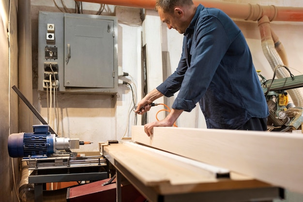 Creative man working in a woodshop