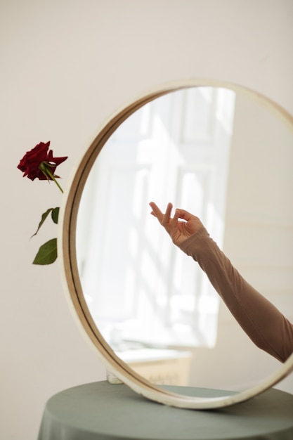 Creative mirror background with flower