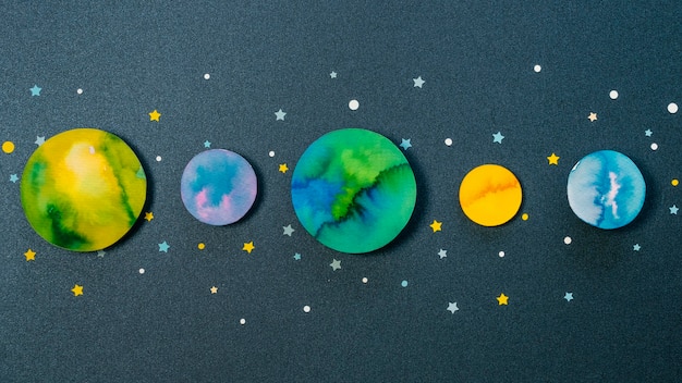 Free photo creative paper planets assortment