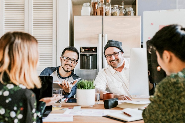 Creative people discussing their project in a startup company