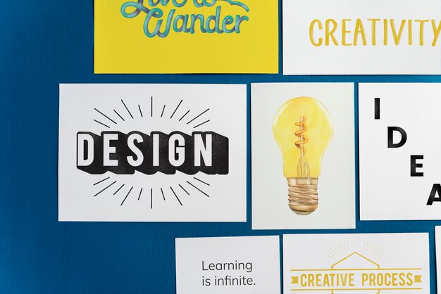 creative postcard set on a blue wall