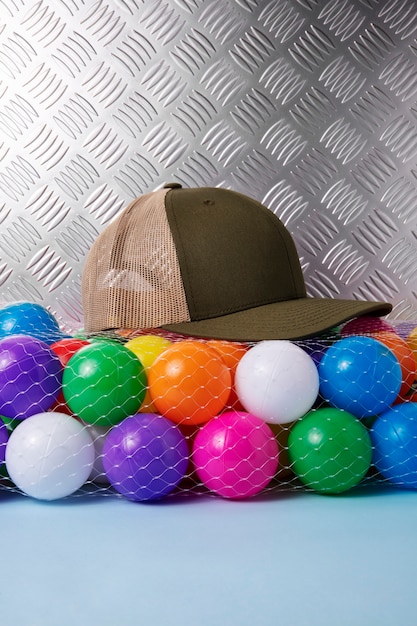 Free photo creative trucker hat still life