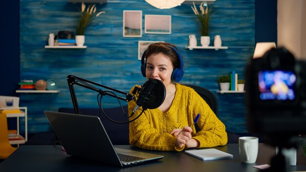 Creative vlogger recording podcast using production station in home studio. Creative online show On-air production internet broadcast host streaming live content, digital social media communication