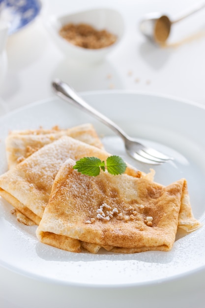 Crepes with icing sugar