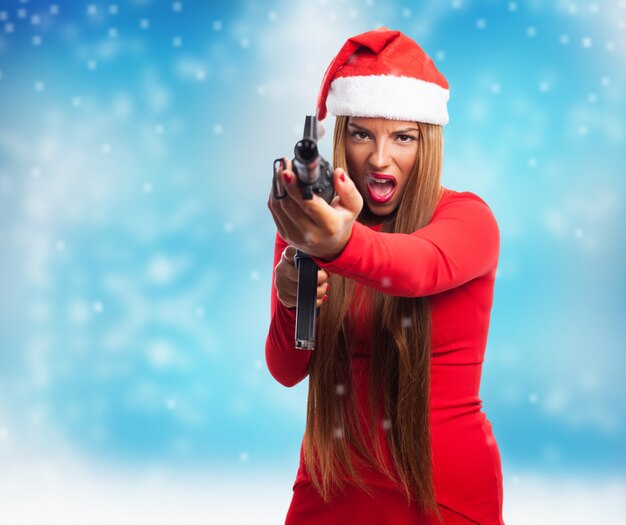 Criminal with santa hat and a pistol