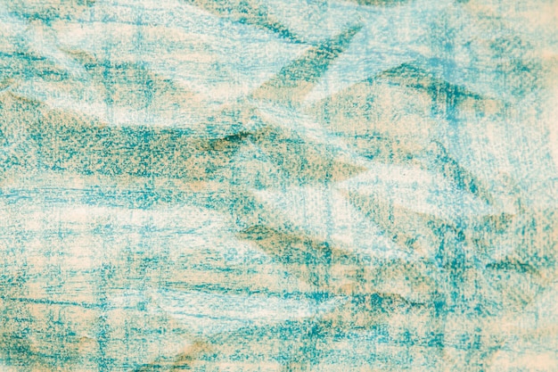 Crinkled blue colored paper texture