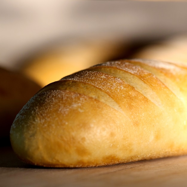 Crisp white bread loaf coated with white powder