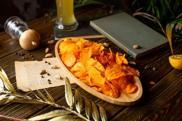 Crispy chips in a wooden bowl