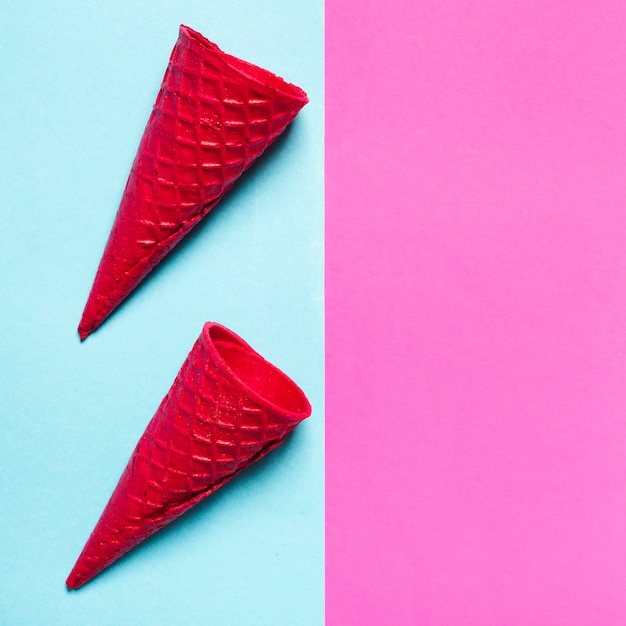 Crispy cones on multicolored background