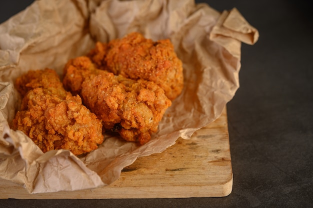 Crispy fried chicken on brown paper