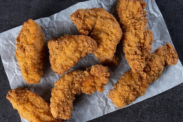 crispy kentucky fried chicken on cutting board