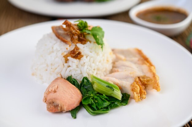 Crispy pork on a white plate.